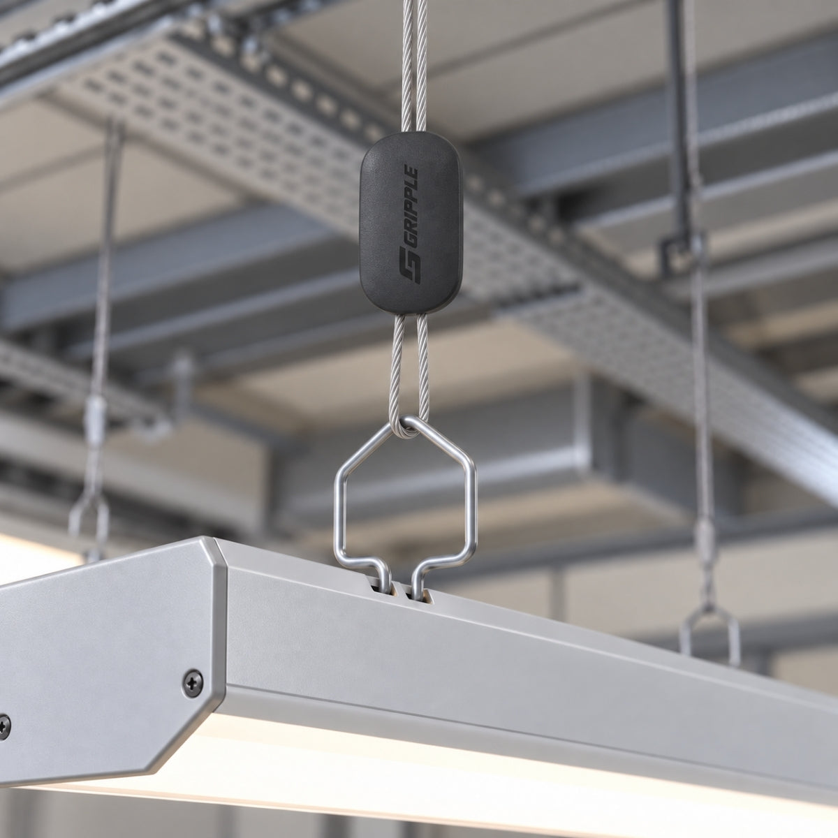 Decor Cover fitted over the fastener on a suspended light fitting.